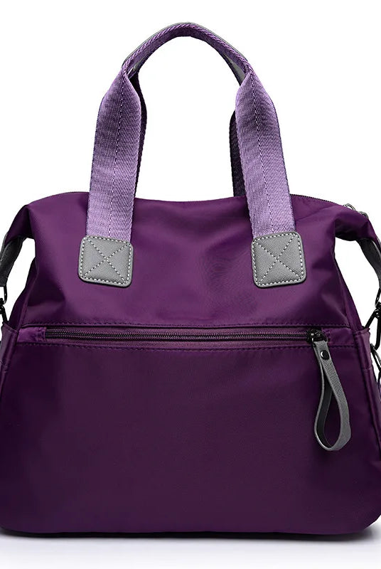 Purple nylon women's large capacity shoulder bag with waterproof material, casual crossbody style, and multifunctional
