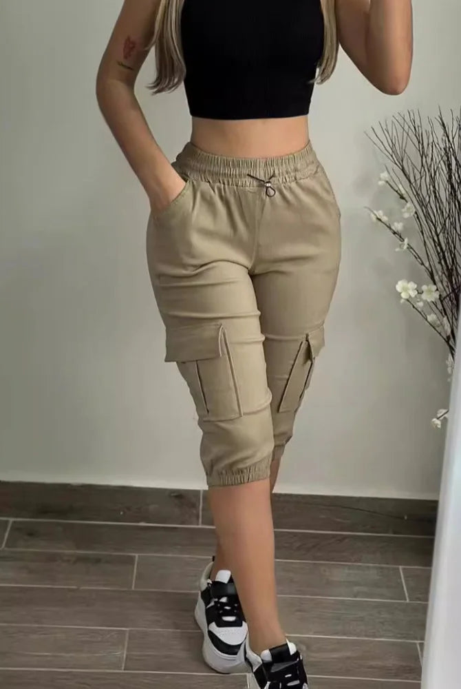 Summer Women's Slim-Fit Capri Trousers Solid Color casual beige high-waist leggings with multiple pockets and lace-up detail.