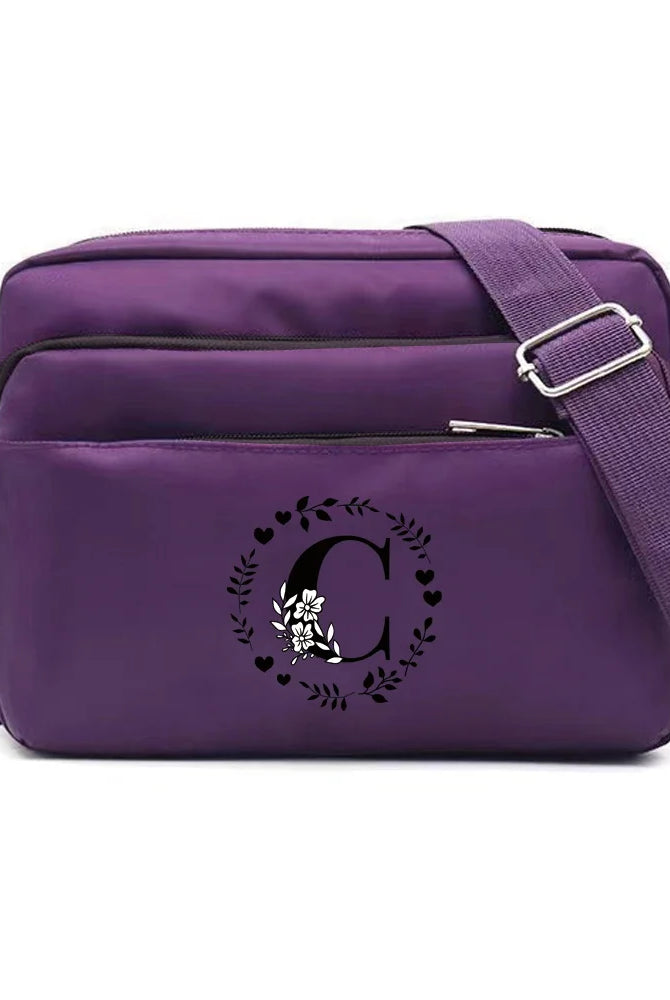 Purple One Shoulder Crossbody Bag with Garland Letter Series print, large capacity, and simple storage design for commuting.