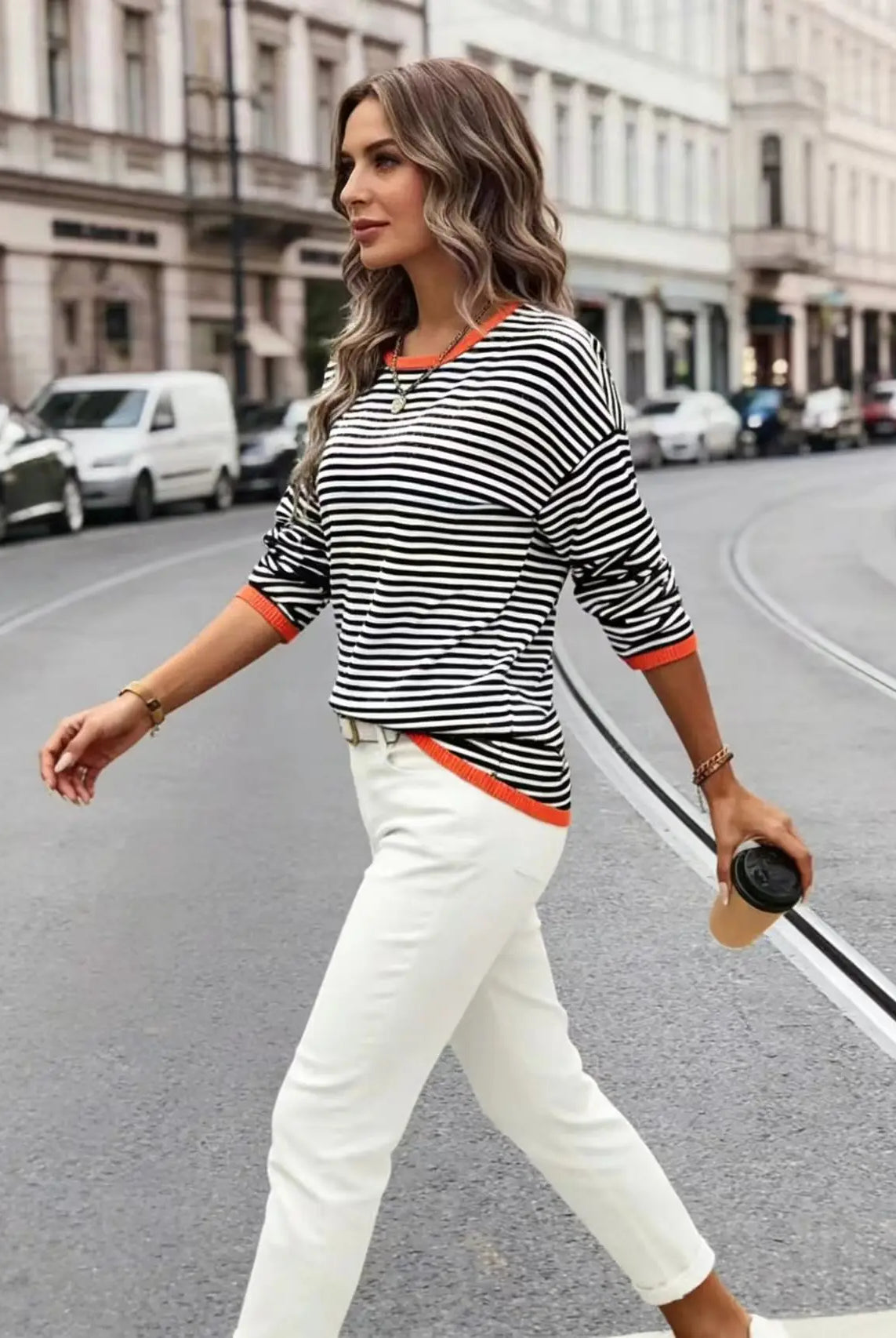 Plus-Size Women's Striped Color-Blocked Fashion Loose Sweater in black, white, and orange for autumn and winter wear.