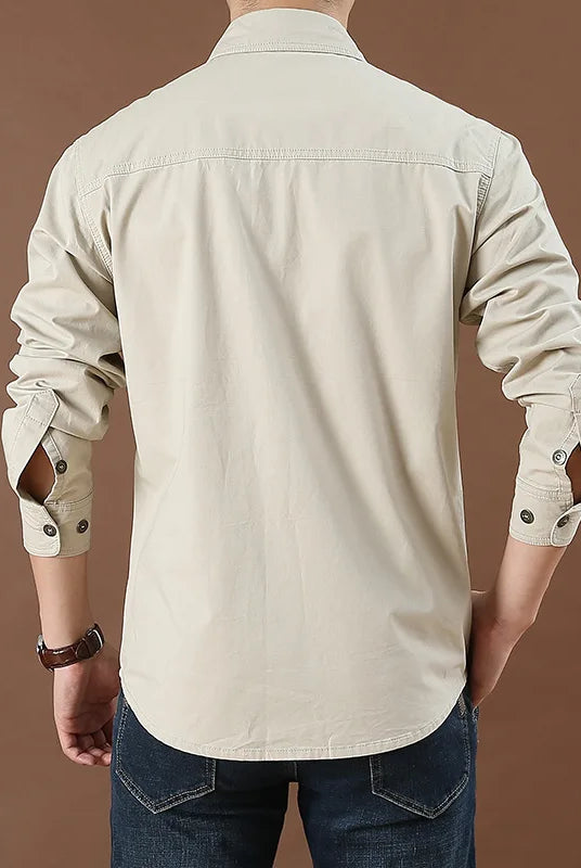 100% cotton men's long-sleeve solid color casual shirt with multi pockets, suitable for spring and fall, in size 6XL, shown from the back.