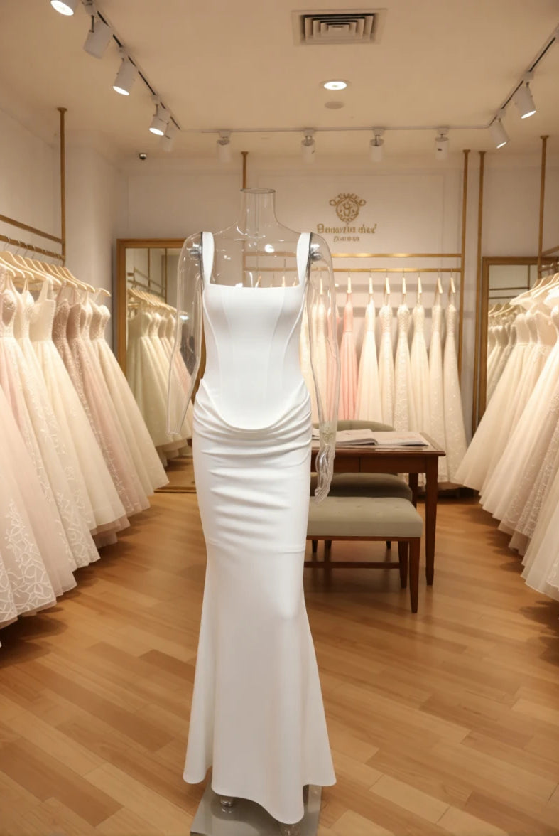 Mingmingxi White Sexy Corset Maxi Dress on a mannequin in a boutique, surrounded by elegant long evening and prom dresses.