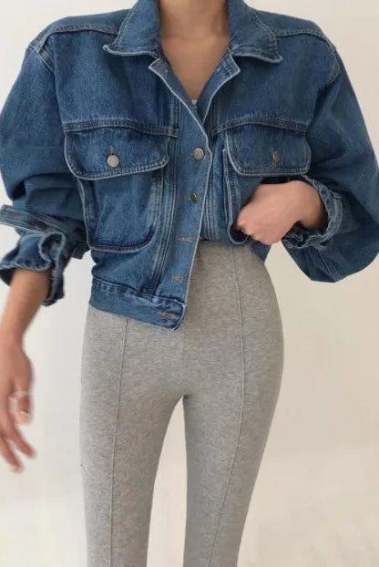 Womens 2022 Y2k cropped denim jacket with puff long sleeves, styled with gray high-waisted leggings.