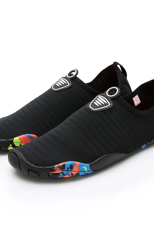 Lager Size Unisex Outdoor Aqua Shoes in black with colorful sole accents, slip-on design, suitable for beach, swimming, and indoor fitness.