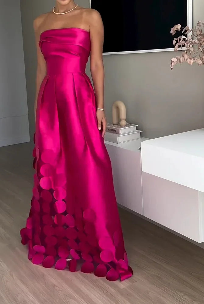 European and American fashion strapless high-waisted evening gown made of vibrant pink wafer satin with circular