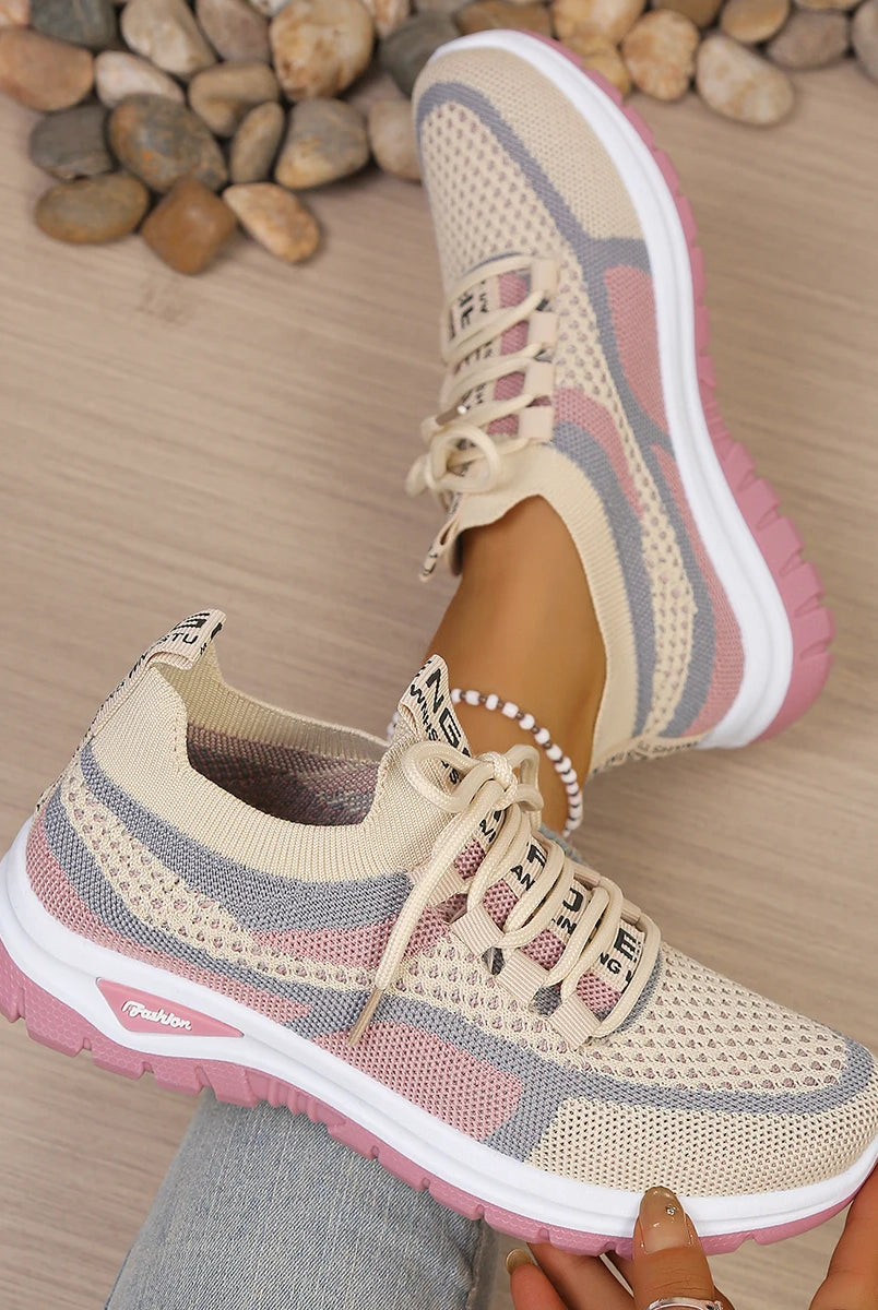 Women's summer 2026 casual sneakers with two-tone pink, beige, and gray mesh upper, soft PVC sole, and lace-up design.