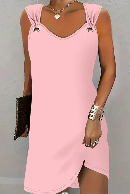 Women's fashionable casual solid color suspender dress sleeveless summer skirt in light pink fabric.