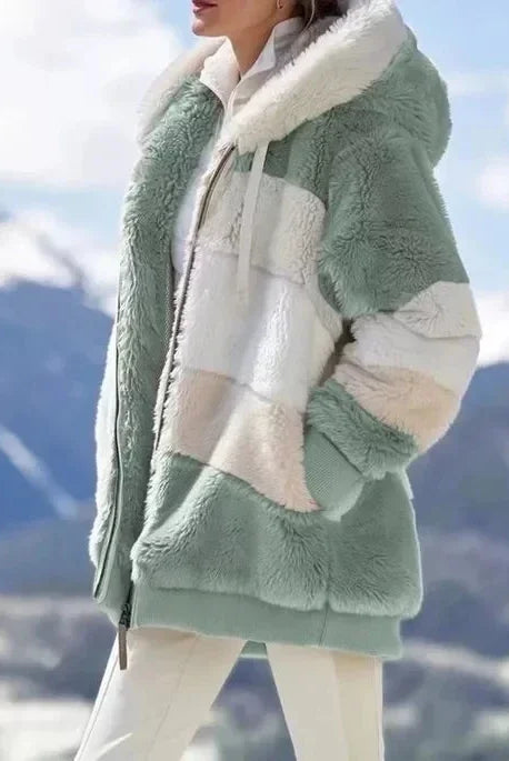 Winter fashion women's coat with hood, zipper, plaid stitching, and cashmere material, ideal for casual cold-weather wear.