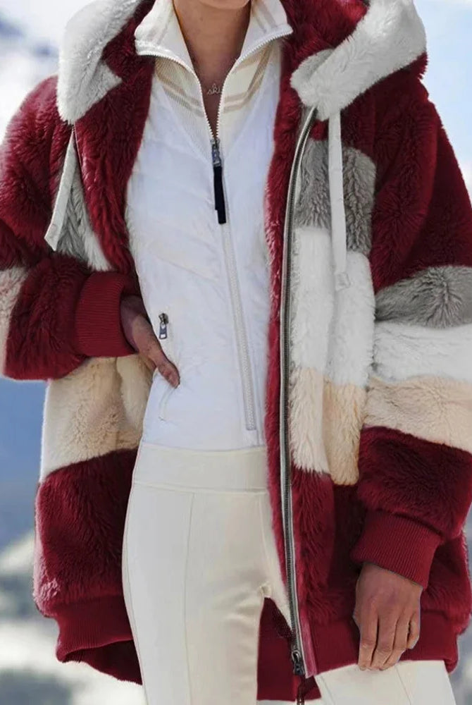 Oversized women's coat for autumn winter featuring plush pockets, hood, zipper, and cashmere blend in neutral tones, streetwear style.