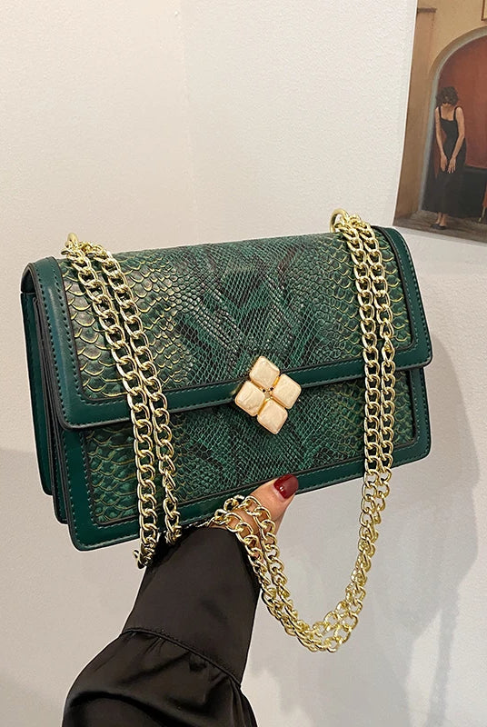 Luxury Purple Women's Single Shoulder Bag with PU leather, gold chain strap, and decorative clasp featuring a flap design.
