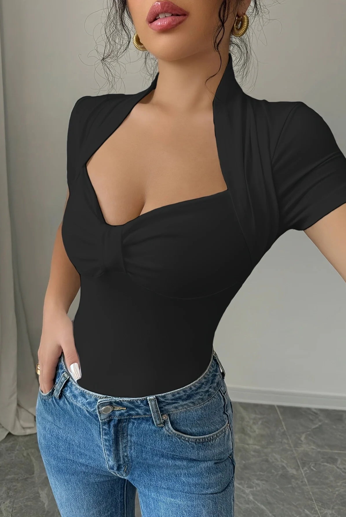 Plus Size V Neck Women T-Shirt casual short sleeve slim fit top in black, made of soft fabric, ideal for spring and autumn