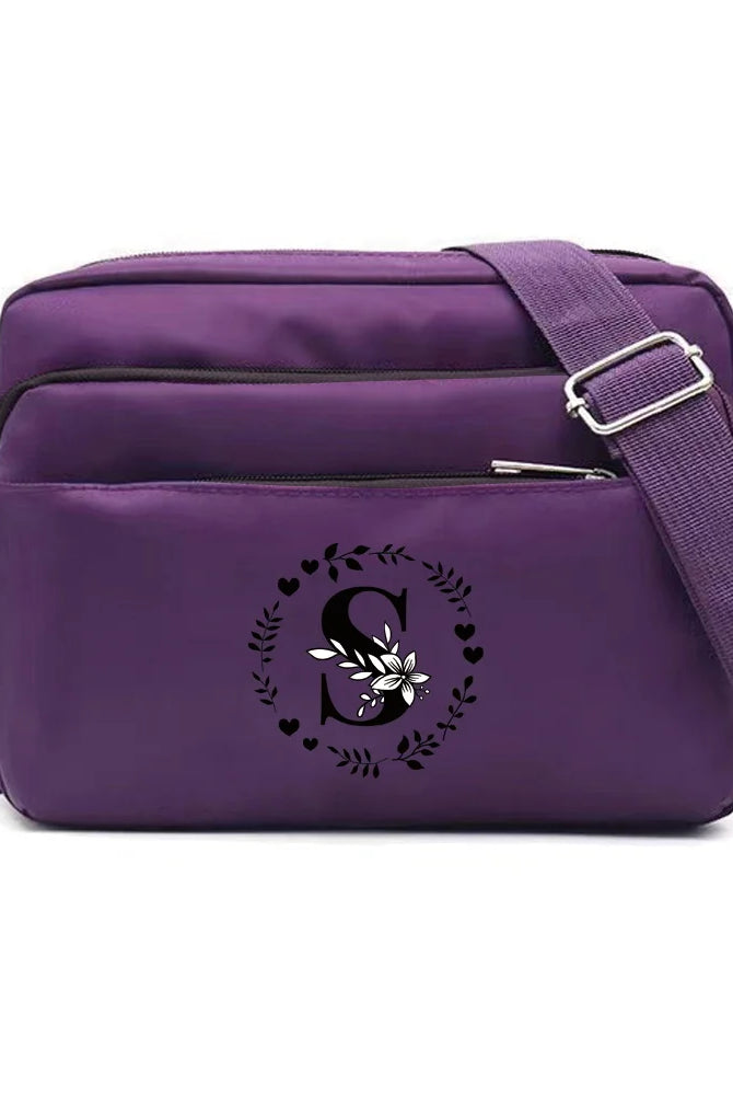 Purple One Shoulder Crossbody Bag with large capacity, Garland letter S print, adjustable strap, and multiple storage