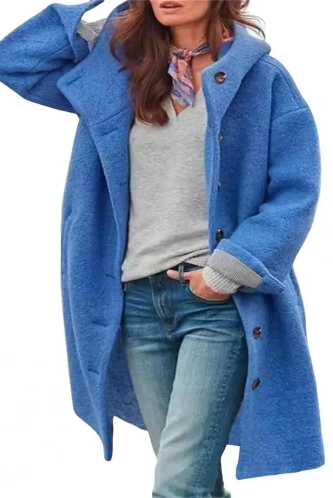 Women windbreaker jacket with hood, long sleeves, pockets, and windproof design in blue for fall and winter casual wear.