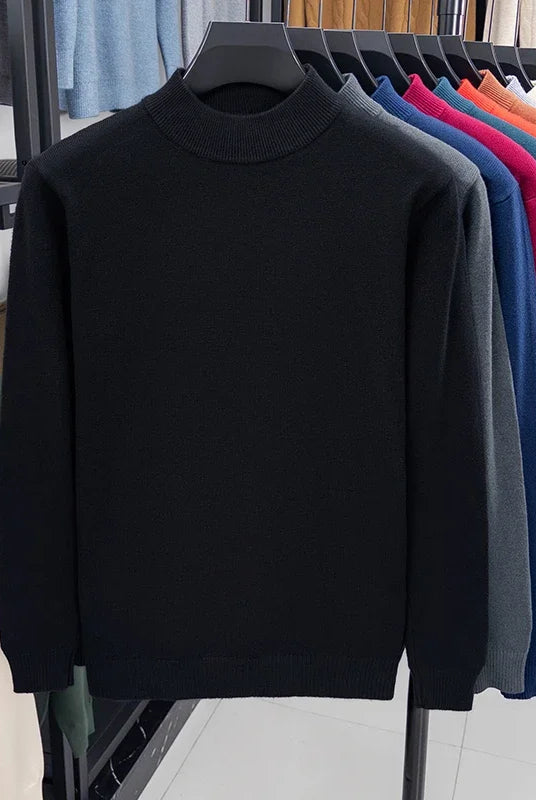 Half turtleneck knitwear sweater for men in solid black, suitable for autumn and winter casual wear.