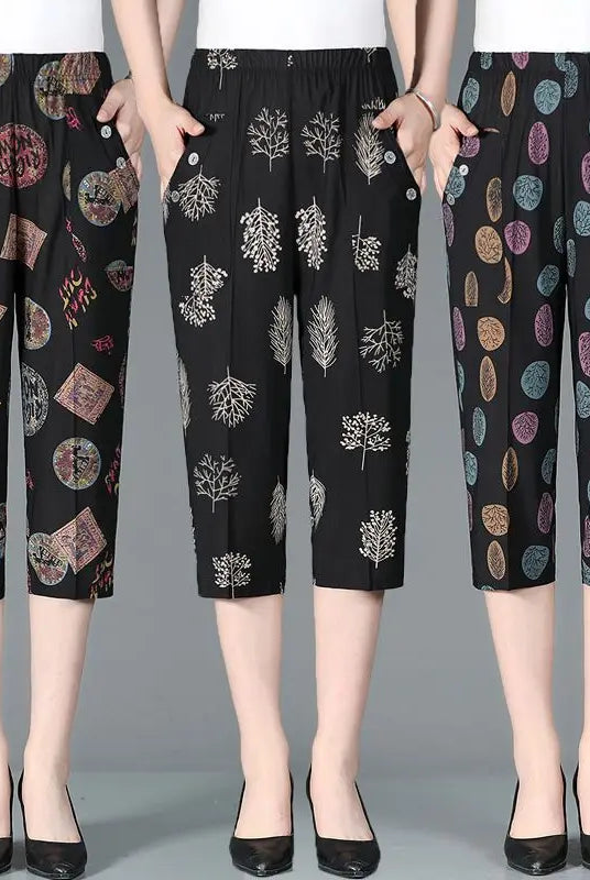 Summer New High Waist Capri Pants Elastic Casual Loose Straight Female Clothing with colorful patchwork, vintage printed patterns, and pockets.