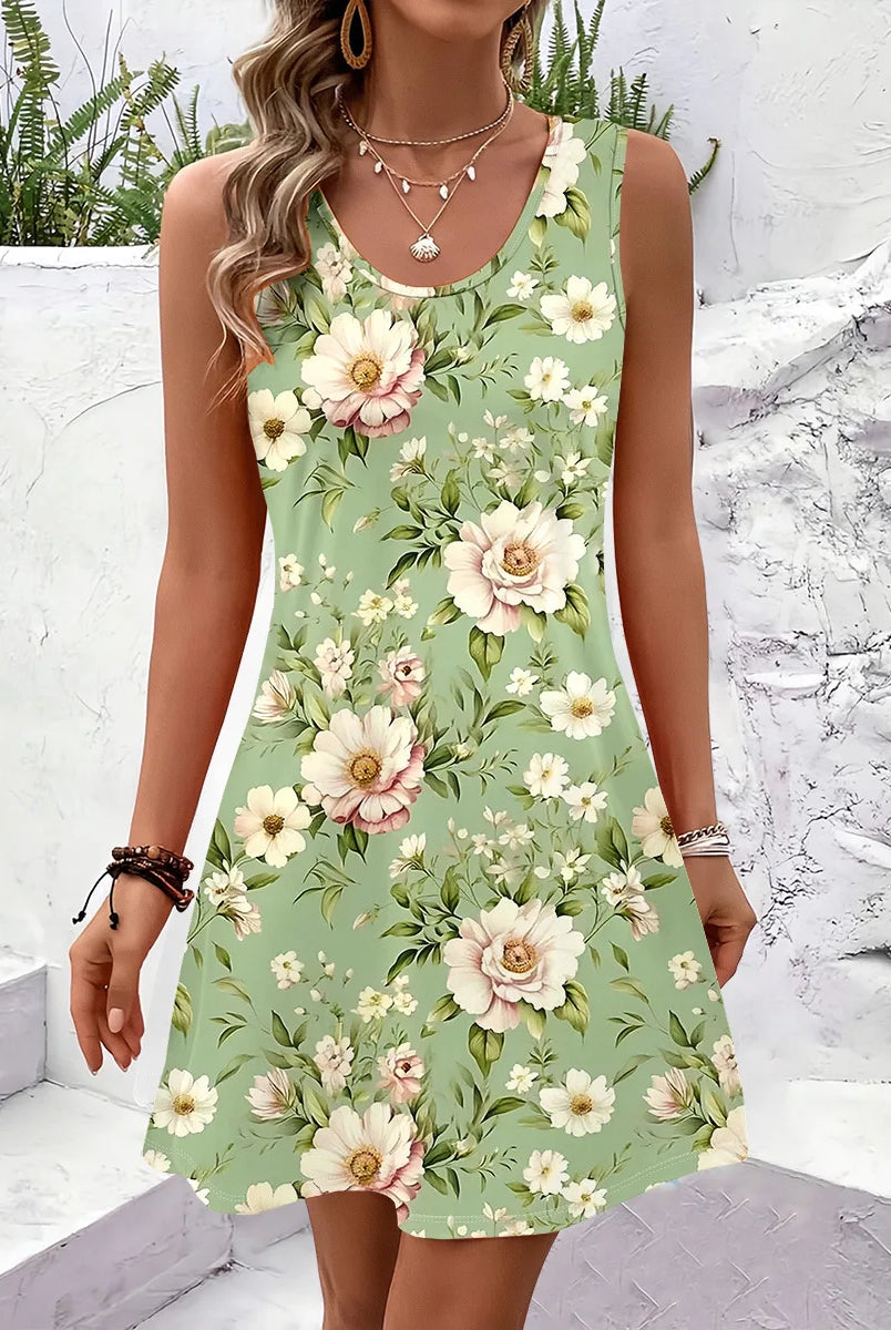 Women Summer Sleeveless Bohemian Dress with large pink and white floral print on light green fabric, ideal for vacation and beach outings.