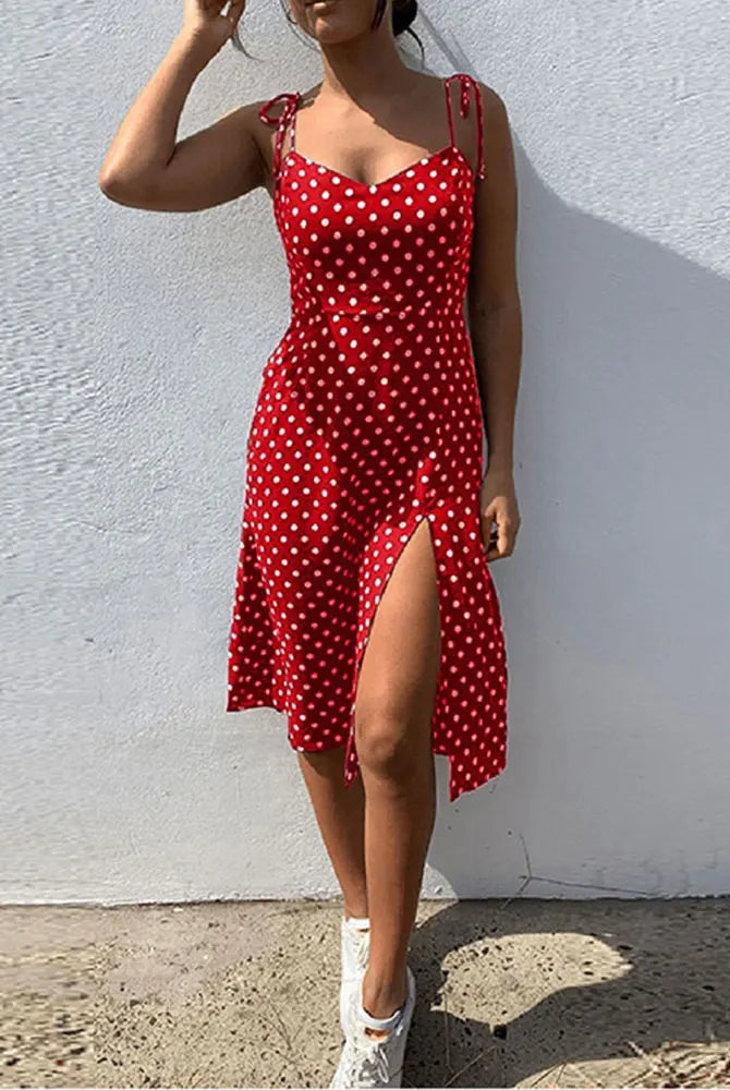 Red polka dot summer sundress with sleeveless design, high pleated skirt, elastic waist, V-neck, suitable for casual