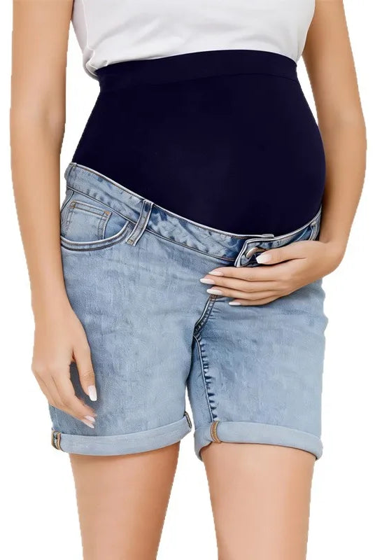 Pregnancy Capri Jeans High Waist Tummy Control Rolled Cuff Denim Shorts worn by pregnant woman with hand on belly, light blue denim, rolled cuffs.