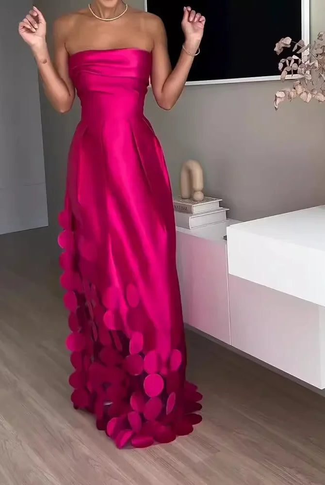 European and American fashion strapless high-waisted evening gown in vibrant pink satin with circular appliqué details and