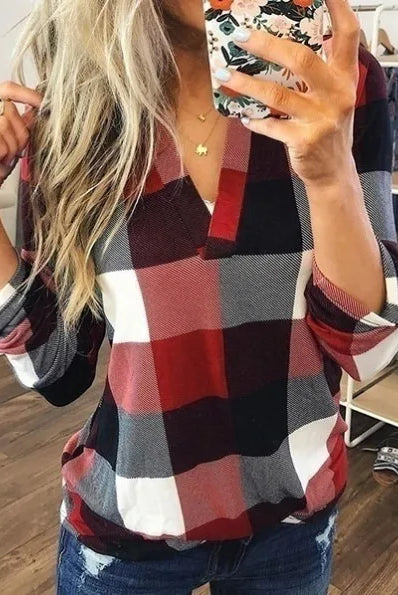 Woman wearing a red, black, white, and gray striped New Spring Fall Stripe Big Zipper Retro Sweater with long sleeves and a