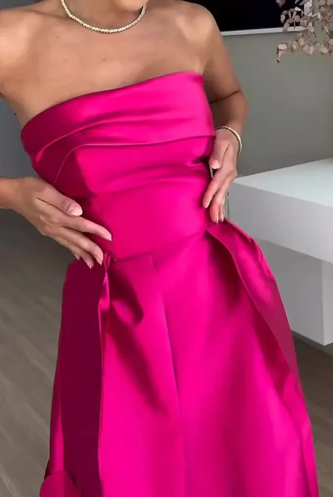 European and American fashion strapless high-waisted evening gown in vibrant pink wafer satin with stitching details.