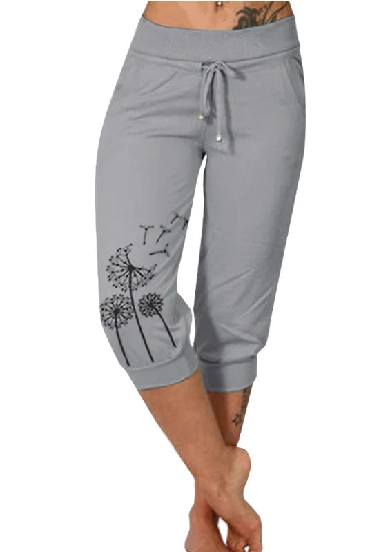 Fashion Mid-calf Lady Capri Pants 2023 Summer drawstring cropped pants with pockets, dandelion print, gray, made of lightweight fabric for outdoor sports and casual wear.