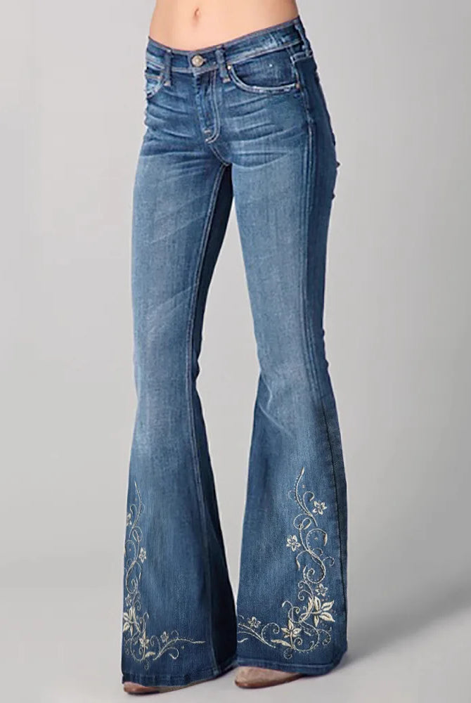 Womens 3D Printed Denim Flared Pants with floral embroidery at the hem, slim fit bell bottom jeans in blue denim for casual outdoor wear.