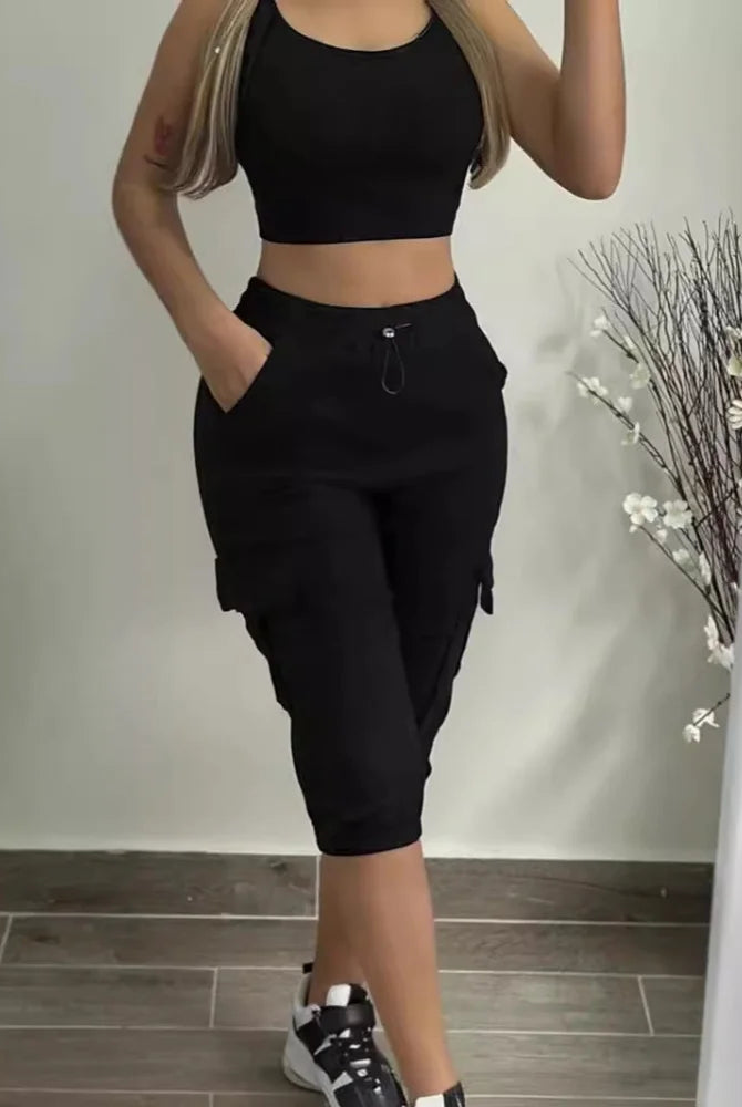 Summer Women's Slim-Fit Capri Trousers Solid Color Casual Multiple Pocket Lace-Up High Waist Tight Leggings Capri Pants in black, with drawstring waist and cargo pockets.