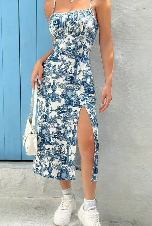 Fall 2025 Long Dress Strapless Wrap Chest High Slit Daisy Leopard Print Wrap Around Skirt Maxi Dress in blue and white, sleeveless with side slit, paired with white sneakers and handbag.
