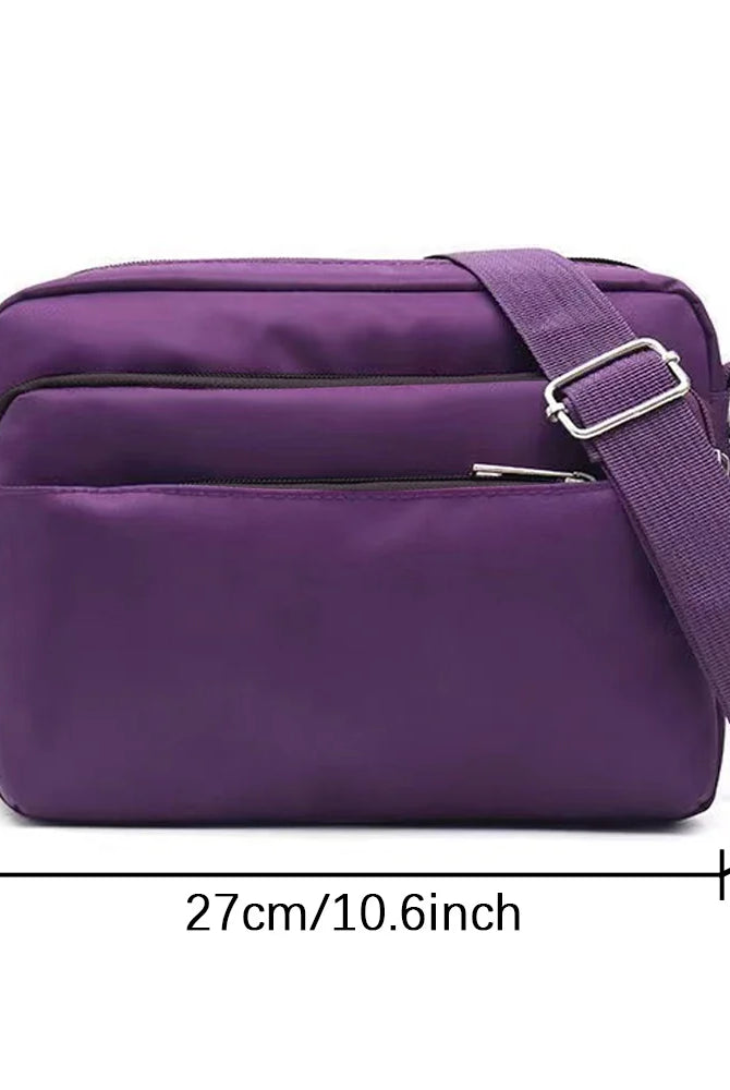 Leisure Purple One Shoulder Crossbody Bag with floral letter print, large capacity, adjustable strap, and multiple zippered