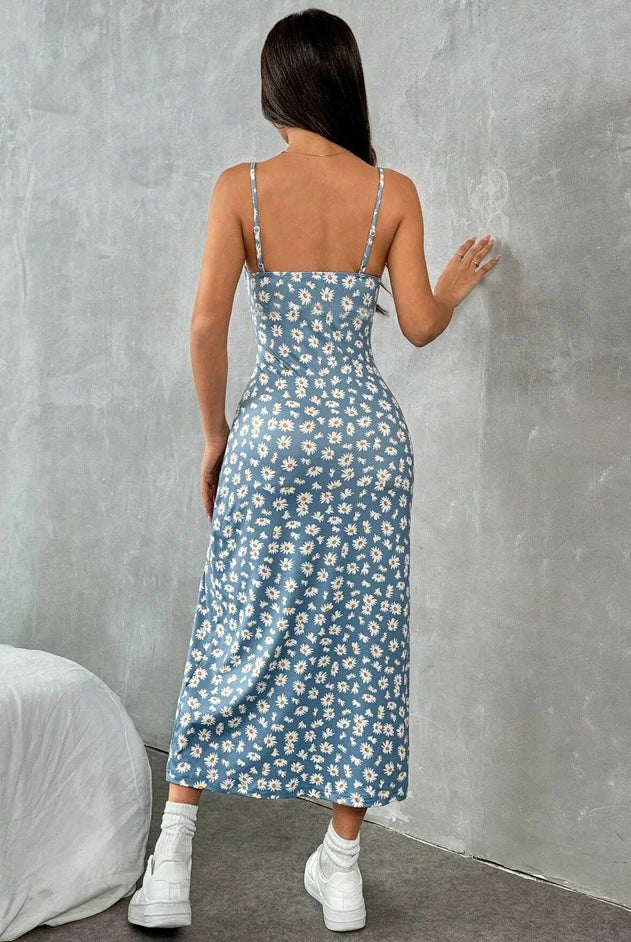 Fall 2025 Long Dress Strapless Wrap Chest High Slit Daisy Leopard Print Wrap Around Skirt Maxi Dress worn by a woman with long dark hair, standing against a gray wall.