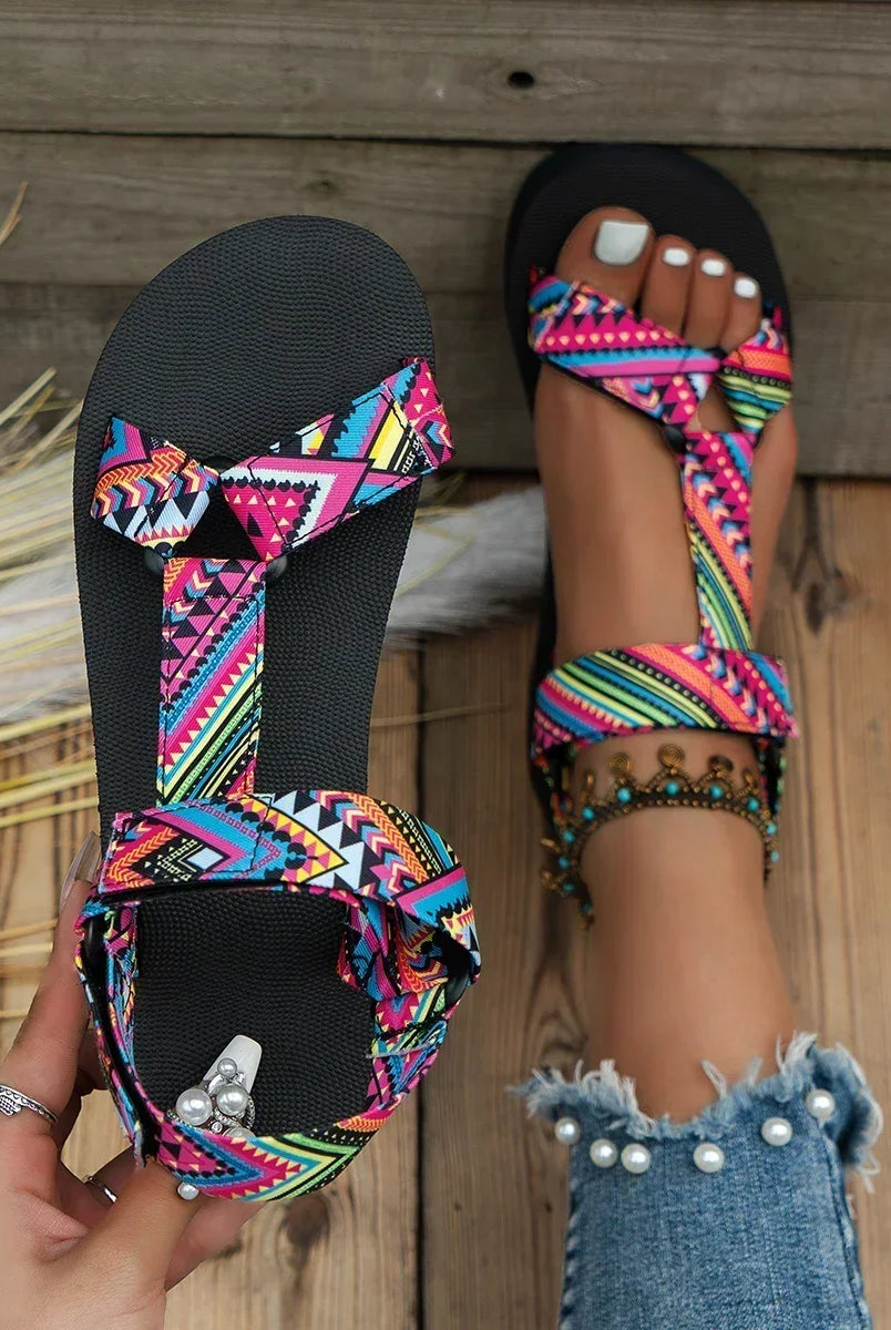 Women's colorful paisley pattern sandals with adjustable ankle strap and quick-dry material, suitable for beach vacations
