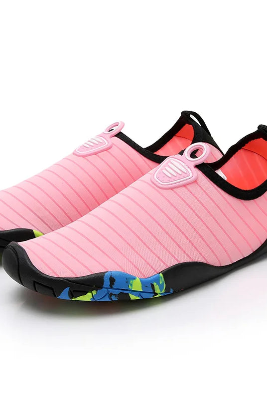 Lager Size Unisex Outdoor Aqua Shoes in pink with black trim and colorful sole, designed for beach, swimming, indoor fitness, and gym use.