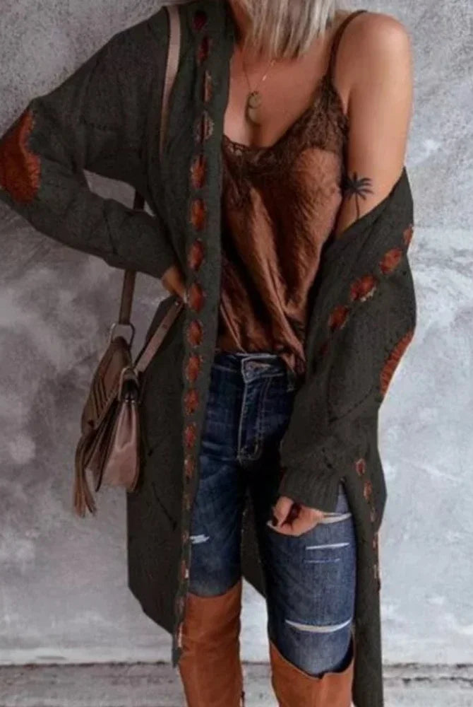Vintage women oversized hooded long cardigan knitted sweater jumper with plaid pattern in brown, worn over a brown satin top