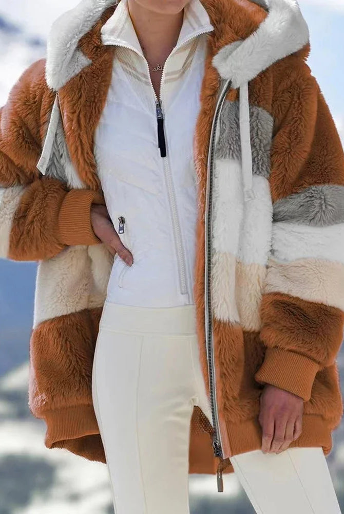 Oversized women's coat for 2025 autumn winter with plush fabric, hood, pockets, and zipper, suitable for streetwear and casual wear.
