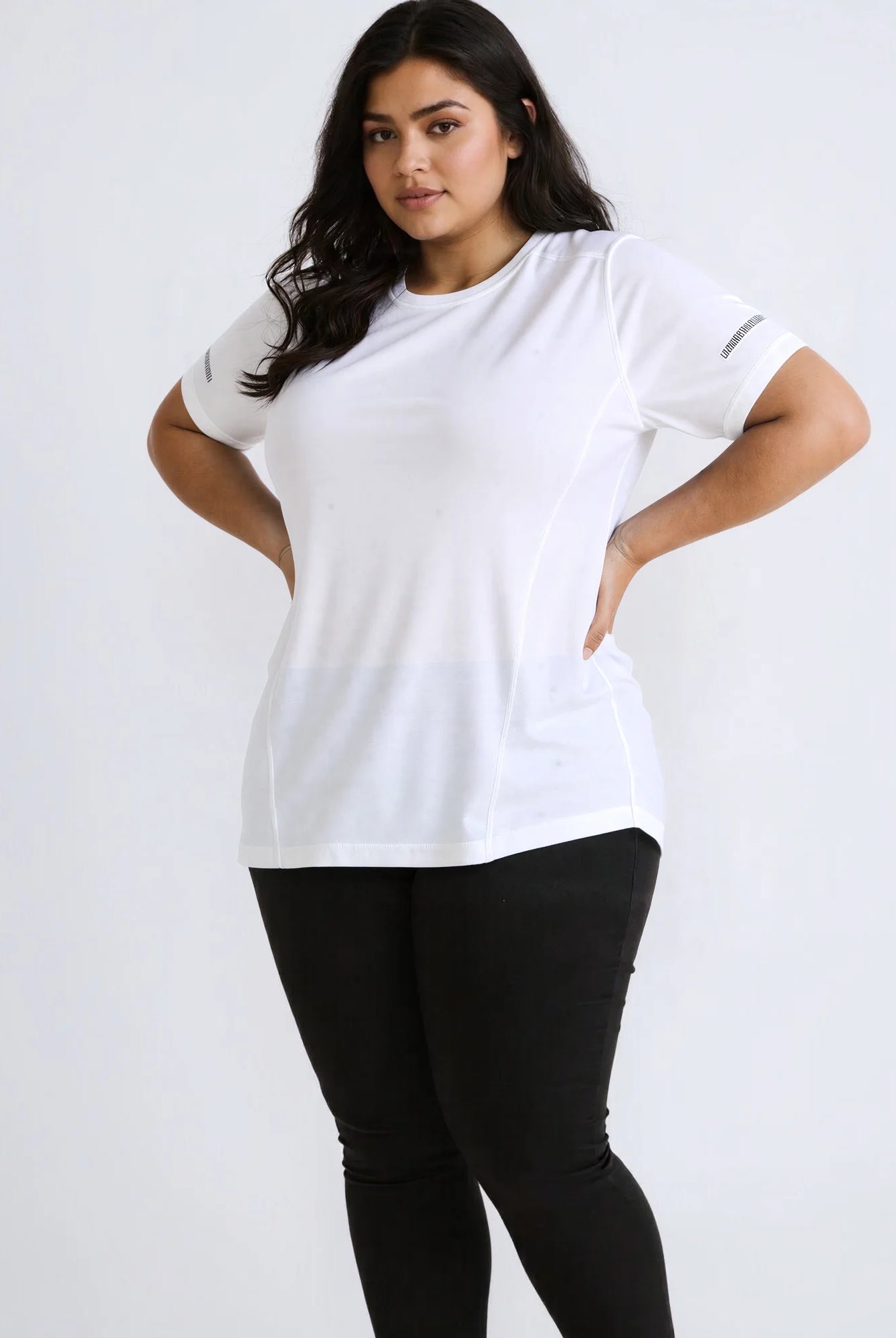 Plus size women's white short sleeve T-shirt with round neck, casual summer top, made of lightweight fabric, sizes 1XL to