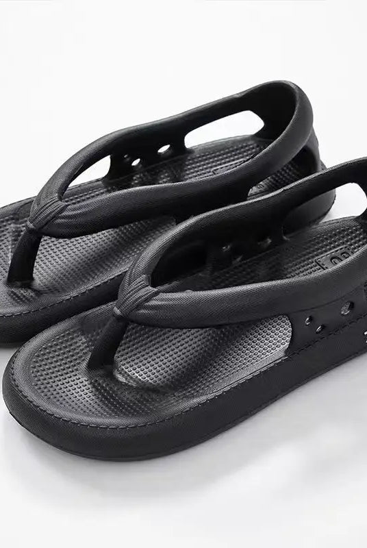 Black thick-soled non-slip beach shoes with adjustable straps for men and women, suitable for summer outdoor wear.