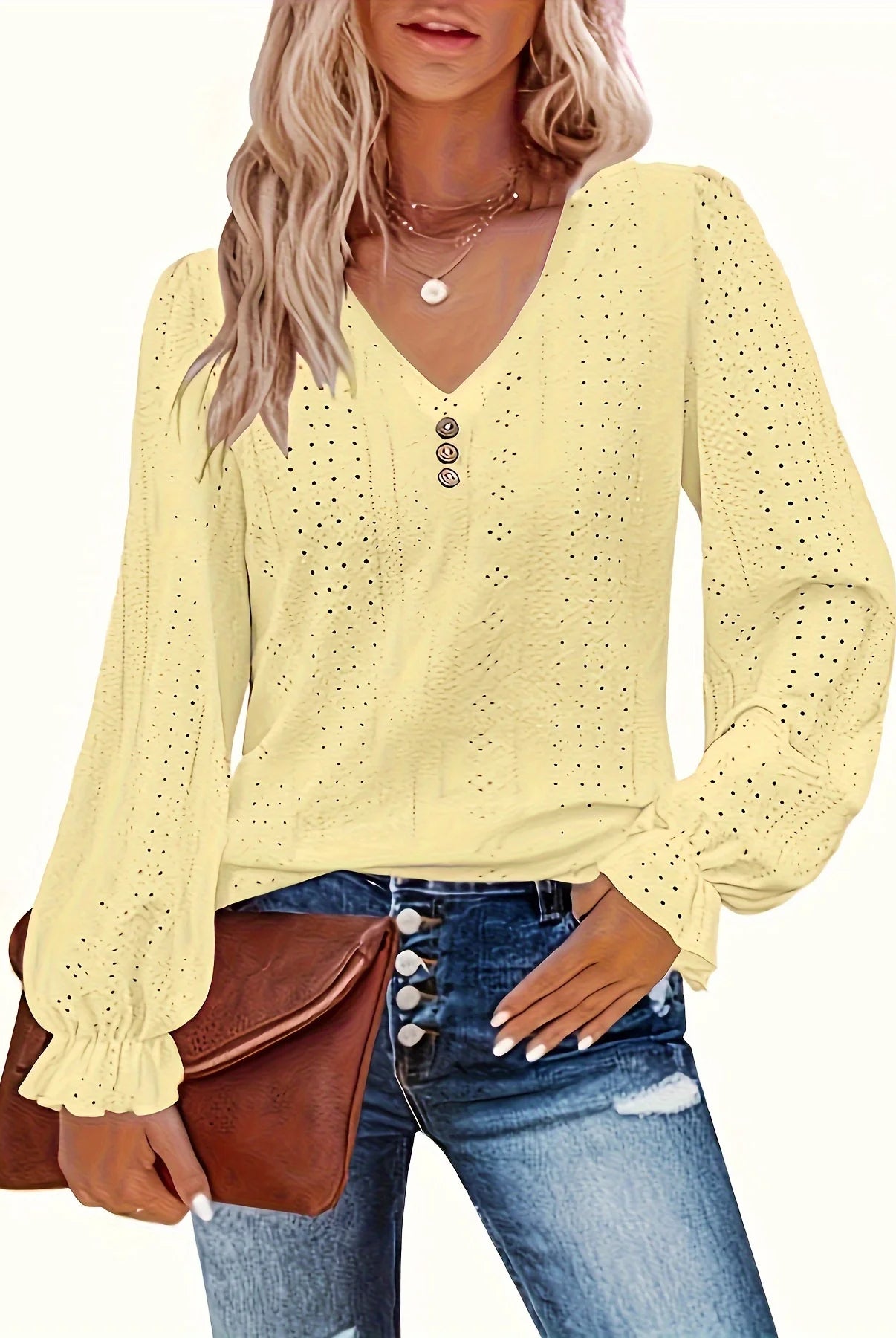 Plus Size Eyelet Button Decor T-Shirt in light yellow with black polka dots, V-neck long sleeve top worn casually with jeans