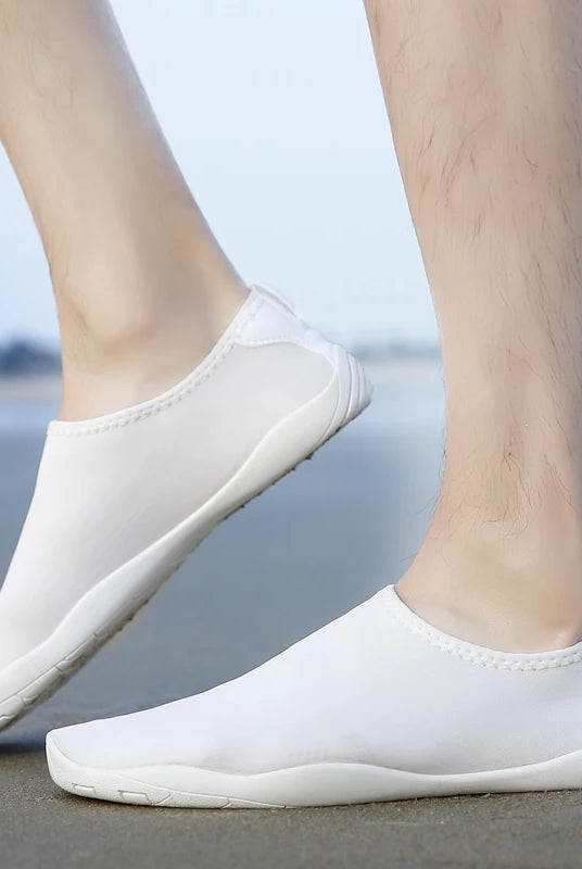 Lager Size Unisex Outdoor Aqua Shoes in white, lightweight slip-on water shoes for beach, barefoot swimming, indoor fitness, and gym activities.