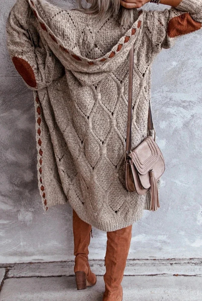 Vintage women oversized hooded long knitted cardigan sweater jumper with plaid pattern in brown, paired with brown knee-high