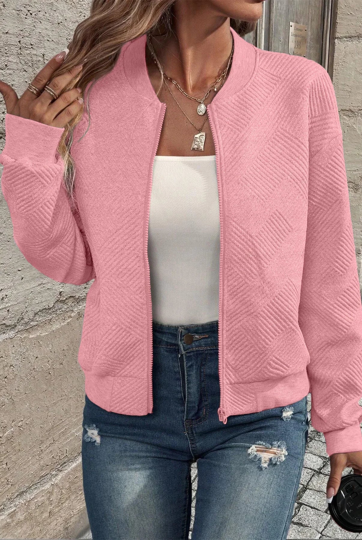 2025 Autumn and Winter New Fashion Women's Sweaters Coats Plus Size Solid Color Zipper Jacket Casual Top in pink with textured knit, front view.