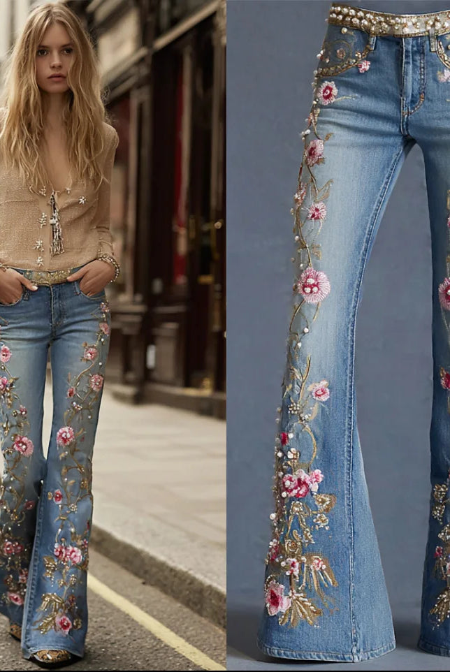Womens 3D Printed Denim Flared Pants with pink floral embroidery, pearl details, slim fit bell bottom style, worn casually outdoors.