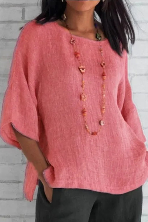 Plus Size Cotton Blouse Shirts Summer O-Neck Three Quarter Loose Casual Blouse Tops for Women in pink with textured fabric.