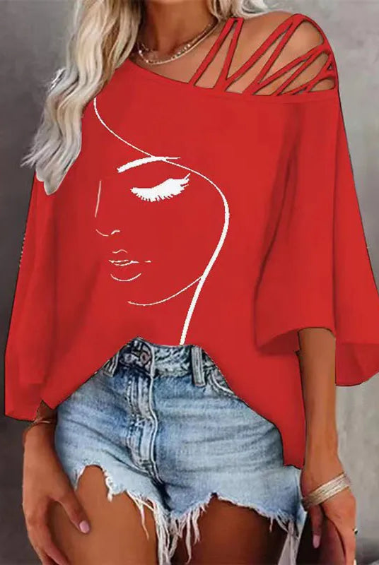 New wholesale autumn fashion patchwork loose casual women's printed t-shirt with a face illustration and cut-out shoulder details.
