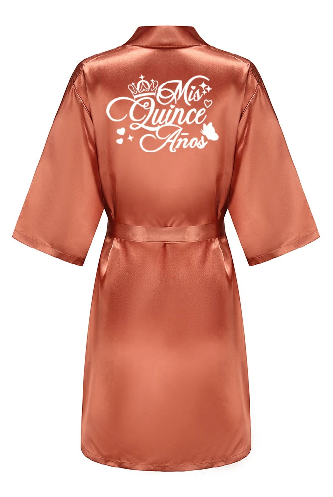 Quinceanera Robes Princess Sweet 15 Years girl birthday party satin bathrobe in royal blue with Mis Quince Años text and decorative graphics on back.