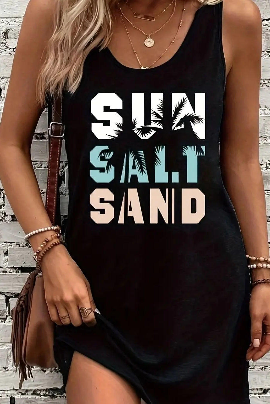 Women's summer sleeveless tank top dress with black print reading Sunsand, featuring palm tree graphics and casual style.
