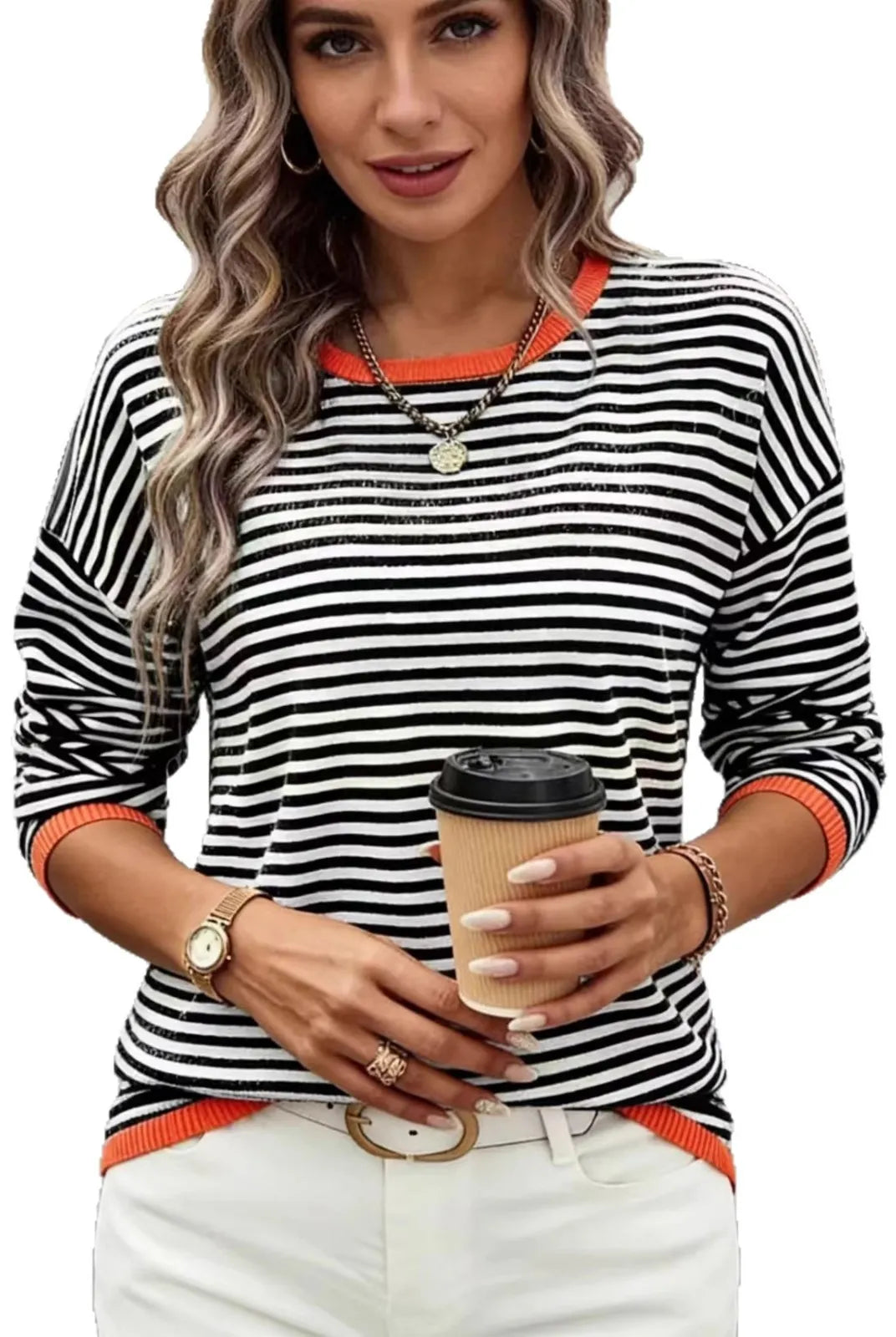 Plus-Size Women's Striped Color-Blocked Fashion Loose Sweater in black, white, and orange for autumn and winter, holding a