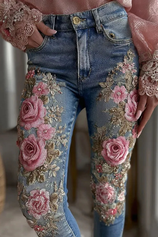 3D floral womens straight leg jeans with pink embroidered roses and foliage, made of stretch denim for casual daily street wear.