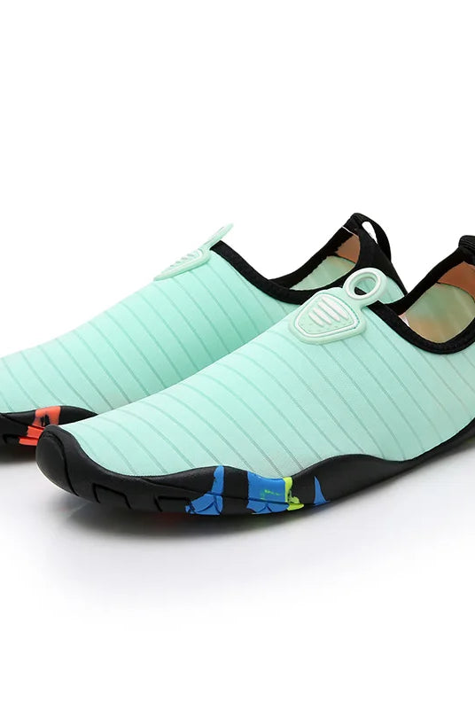 Lager Size Unisex Outdoor Aqua Shoes in light green with black trim and colorful sole accents, designed for beach, swimming, indoor fitness, and gym use.