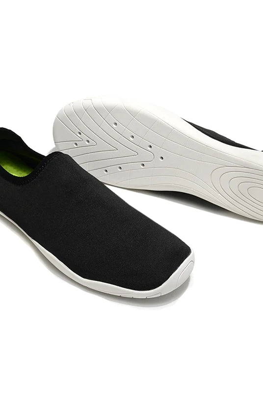 Lager Size Unisex Outdoor Aqua Shoes for couples, black fabric with white sole, suitable for beach barefoot swimming, indoor fitness, and gym use.